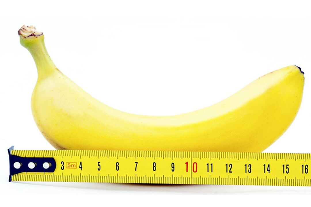 en banan med lineal symboliserer målingen af ​​penis efter operationen